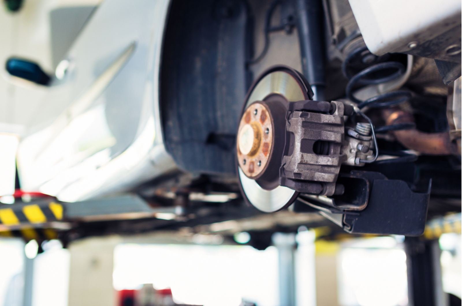 Brake rotor and caliper on a lifted vehicle