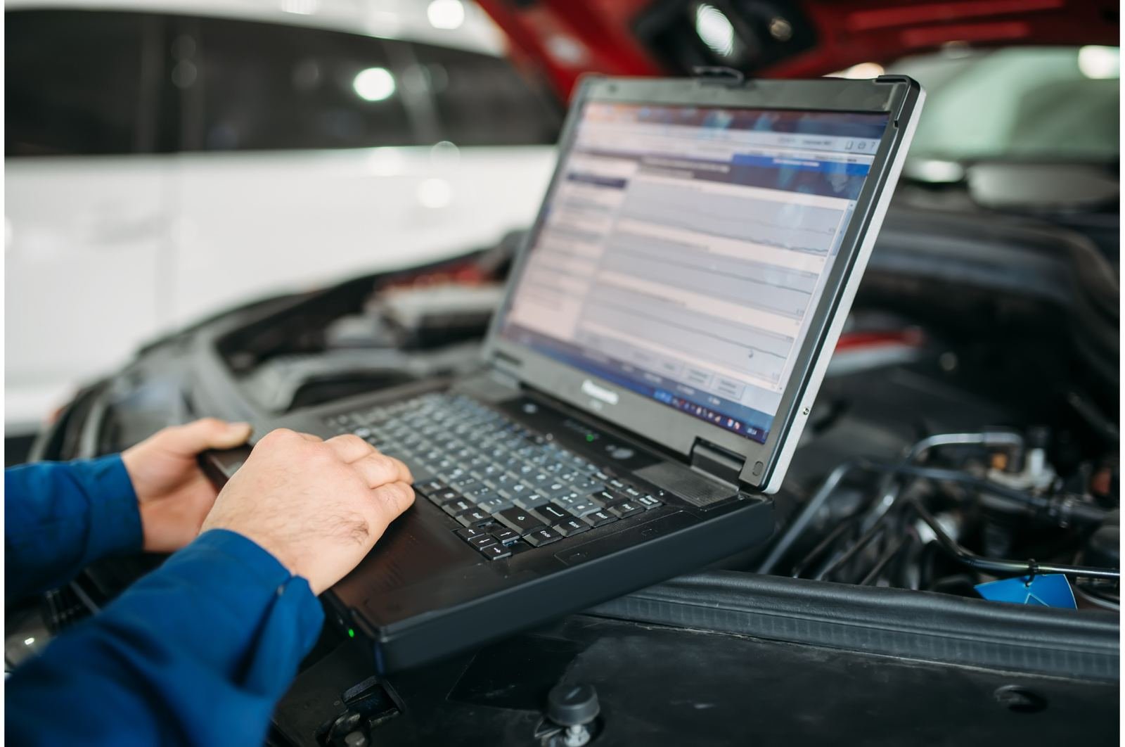 Technician running a diagnostic scan