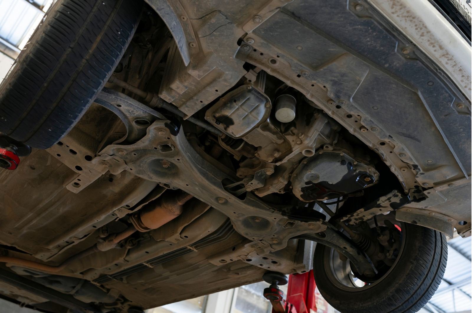 Underside of a vehicle showing suspension components